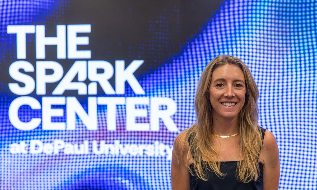 LeAnne Wagner infront of digital screen