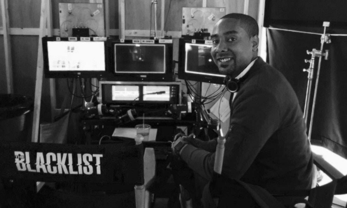 Daniel sitting on his director chair