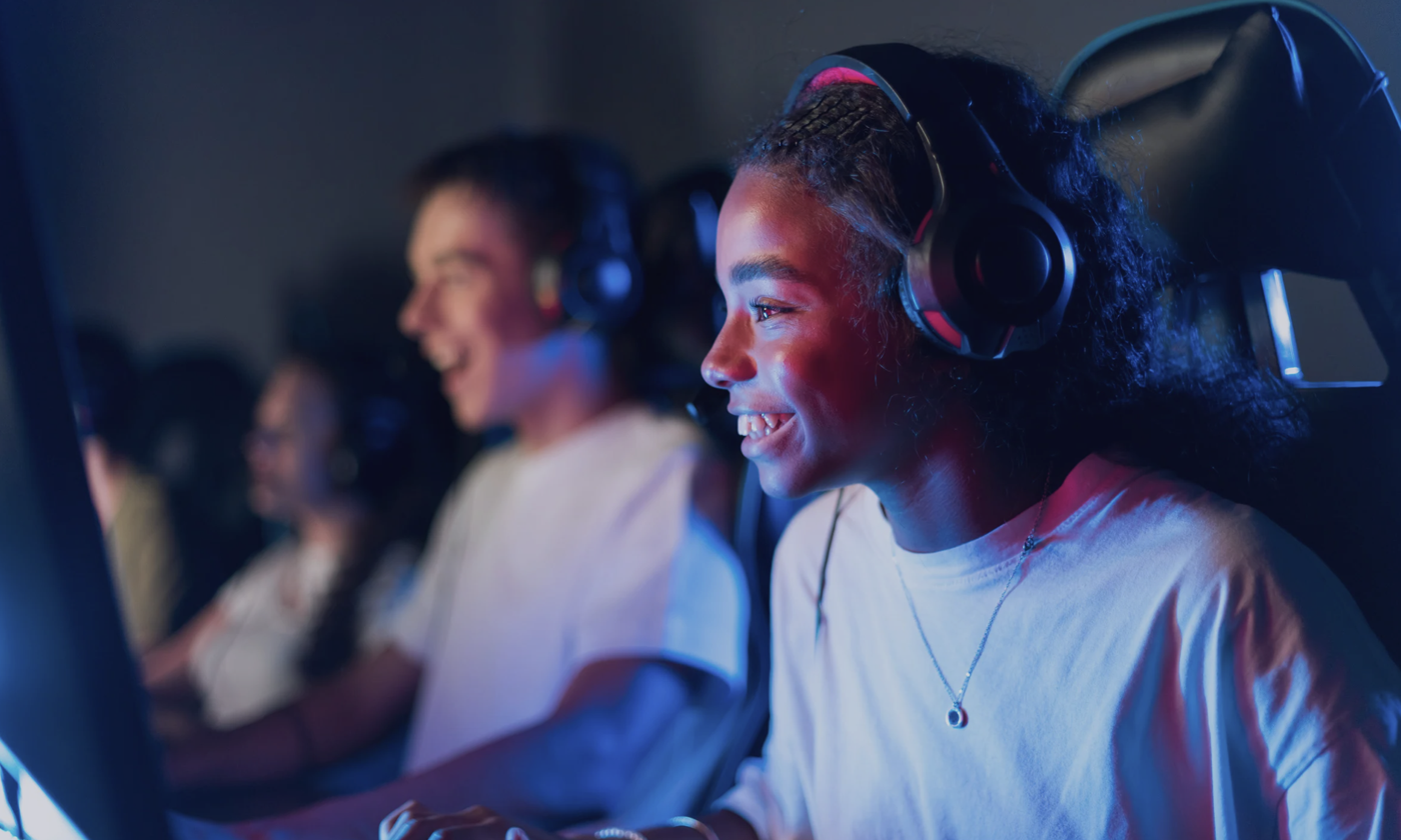high school students having fun pc gaming