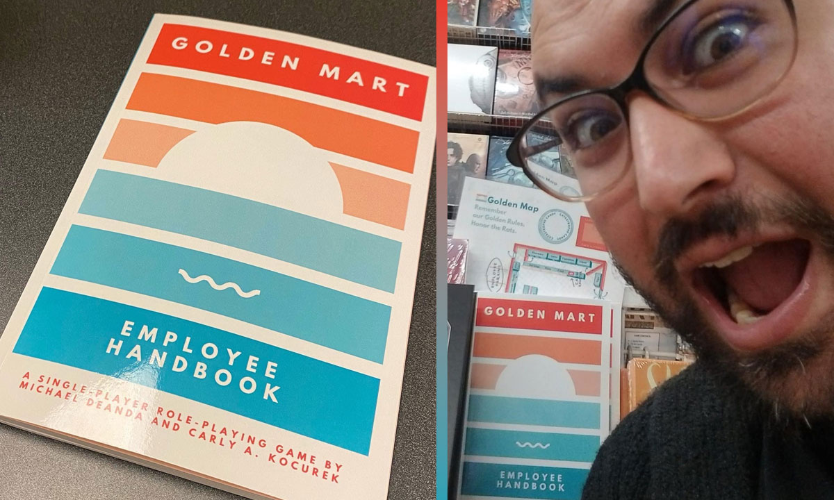 author posing infront of his published book