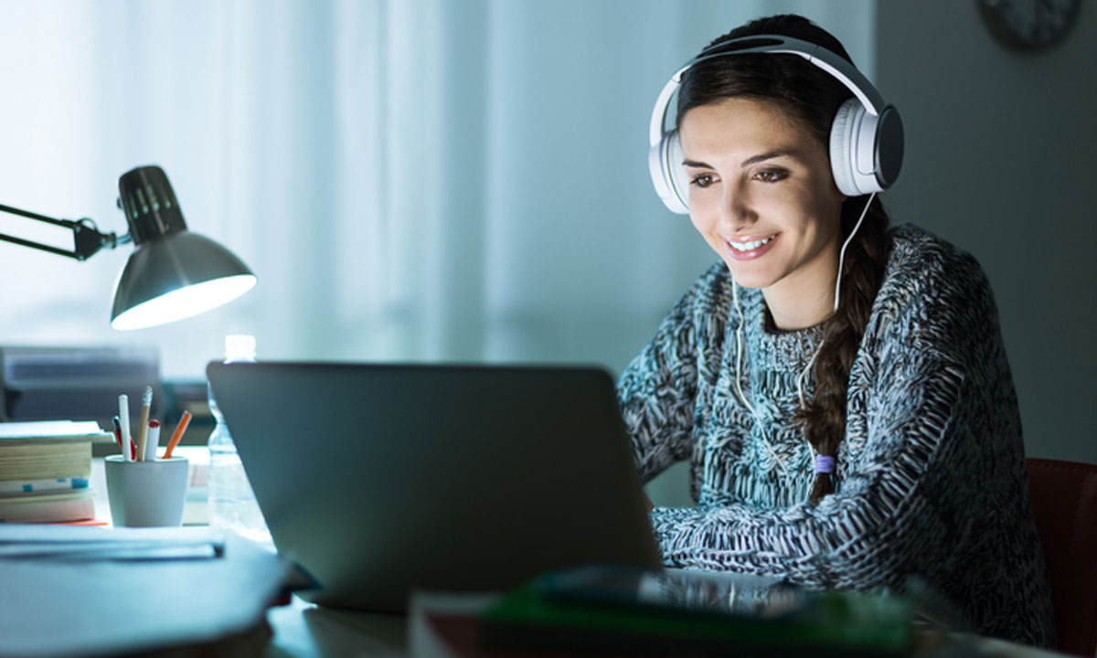 student using her laptop